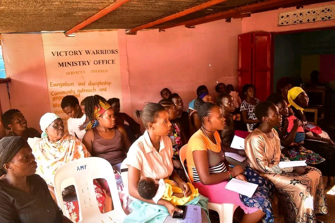 Adult literacy class participants learning together
